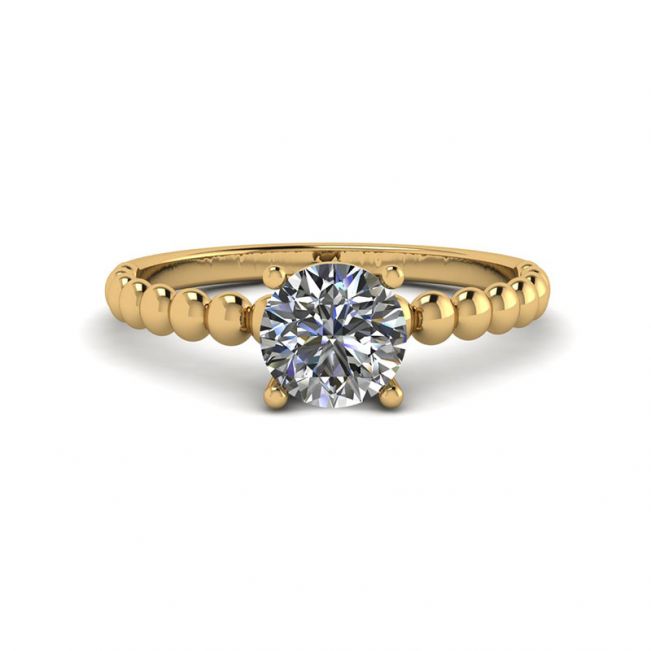 黄金串珠戒指上镶嵌圆形钻石单石
