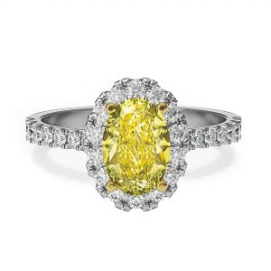 1.13 克拉椭圆形黄钻戒指，带钻石光环